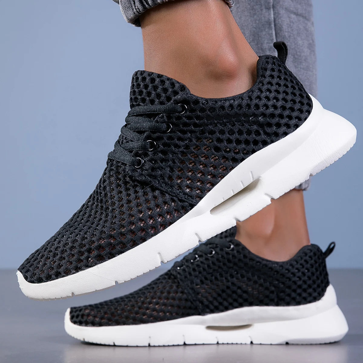 Women's white mesh walking sneakers with comfort support, cushioned insole and breathable flexible sole