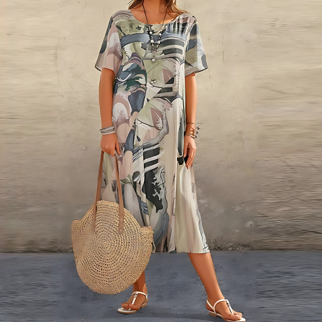 Elegant floral midi dress in vibrant multicolor print with flattering feminine silhouette