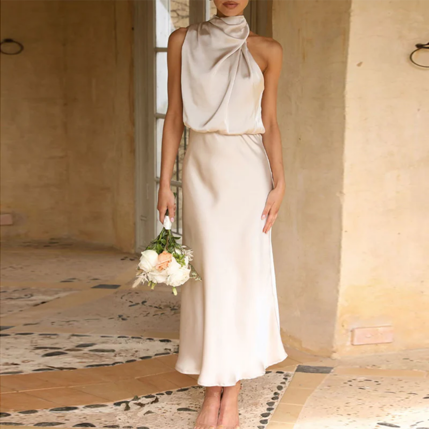 Women's satin-look halterneck evening dress with fitted waist, elegant silhouette for formal events