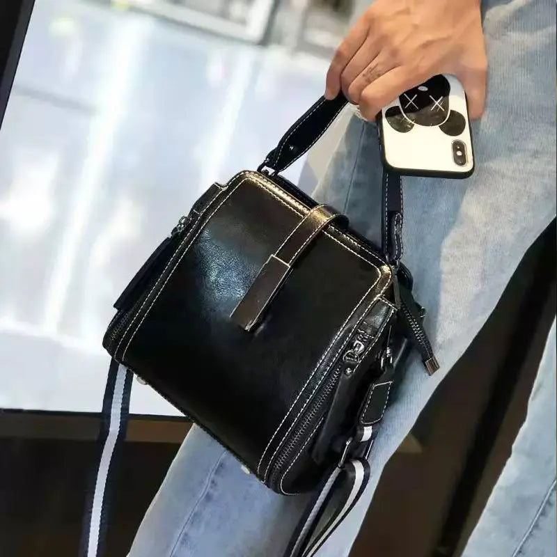 Wavlynn Cathy structured leather crossbody bag with adjustable shoulder strap and top handle