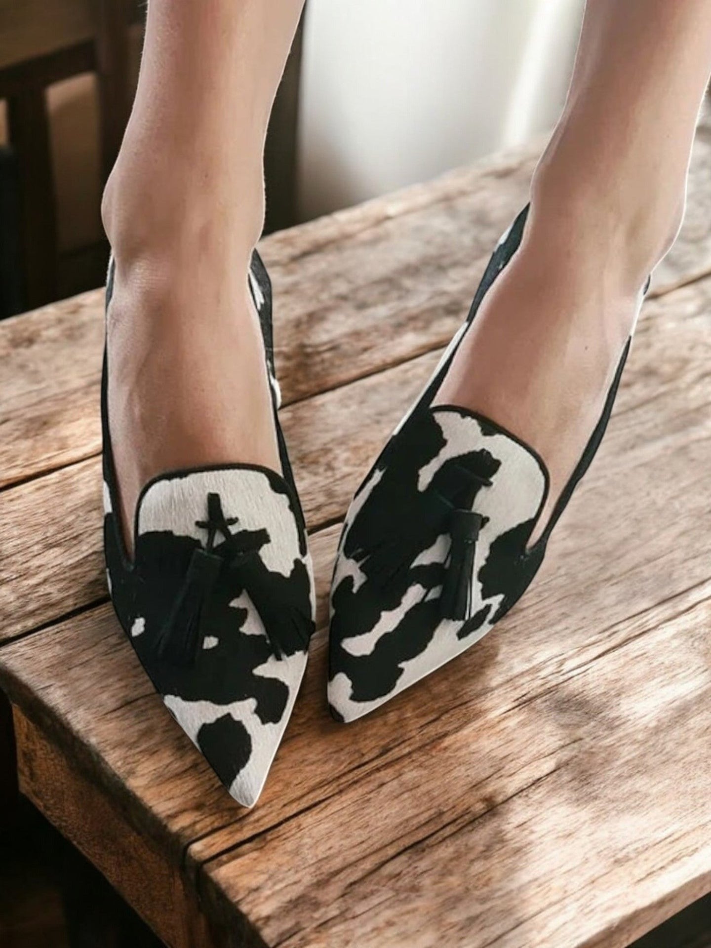 Elegant pointed toe loafers in classic design with sleek silhouette for modern sophisticated style