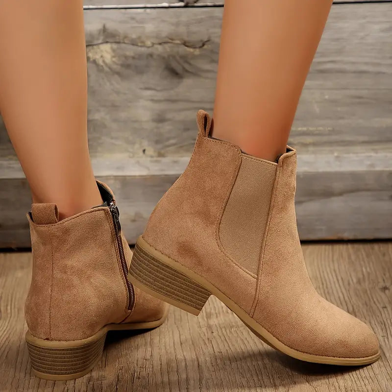 Anica™ sleek black ankle boots with polished silhouette and leg-lengthening streamlined design