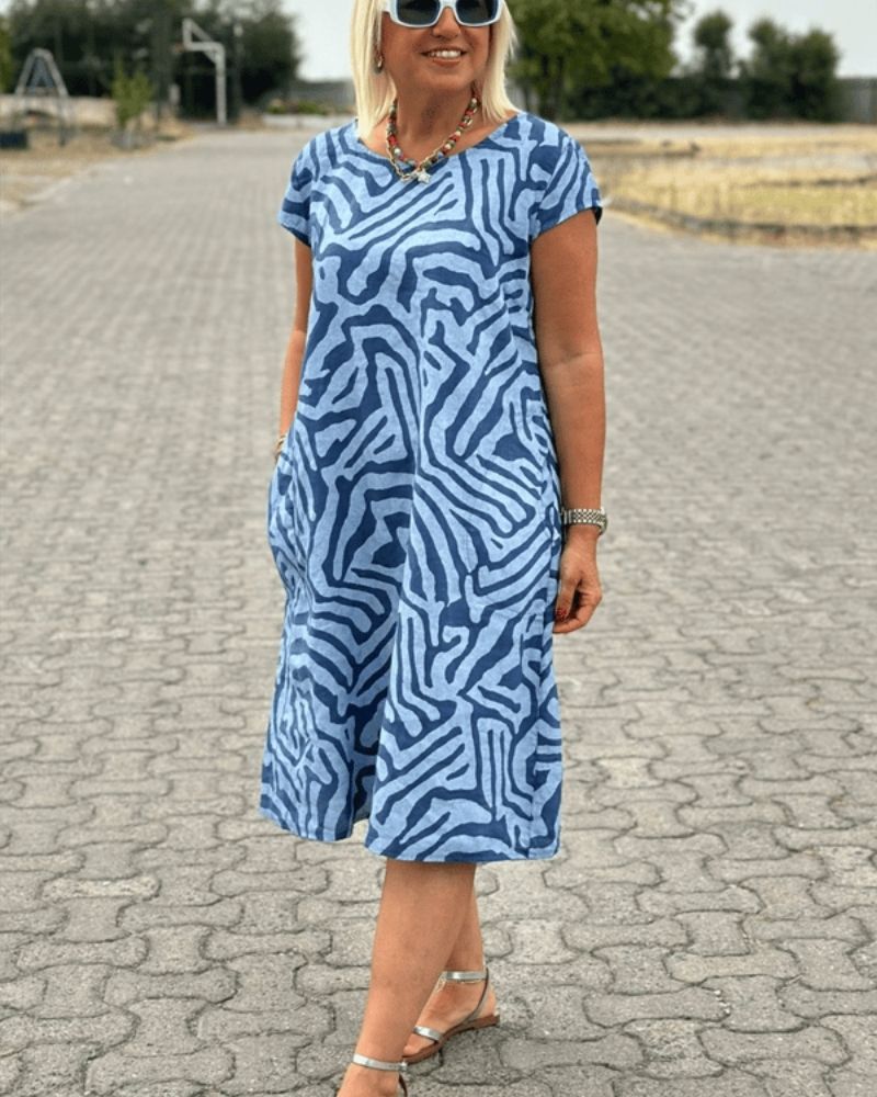 Christina floral print summer dress with round neckline, vintage-inspired lightweight elegant design