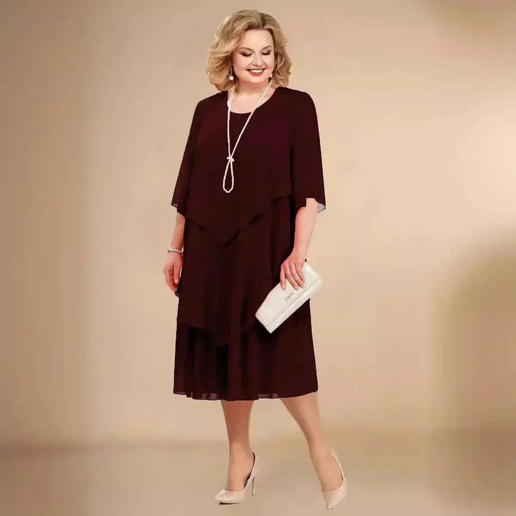 Elegant chiffon dress with flowing layered silhouette, flattering cut for weddings and special occasions