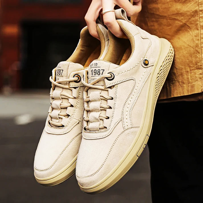 Aurel 1987 full-grain leather sneaker in classic white with artisanal texture and timeless low-top silhouette