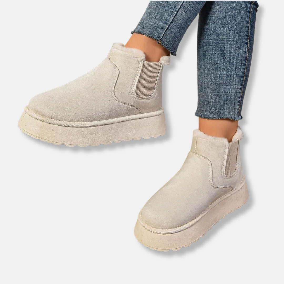 Women's black synthetic suede slip-on ankle boots with chunky platform sole for elevated everyday style