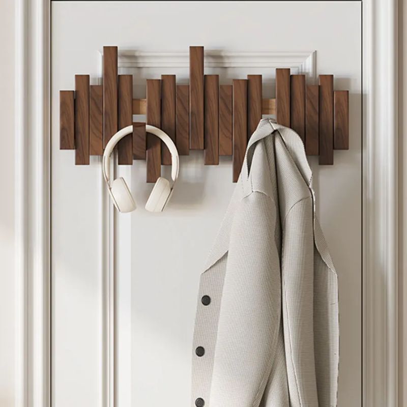 Kynna natural wood wall coat rack with foldable hooks, sleek minimalist design for elegant home decor