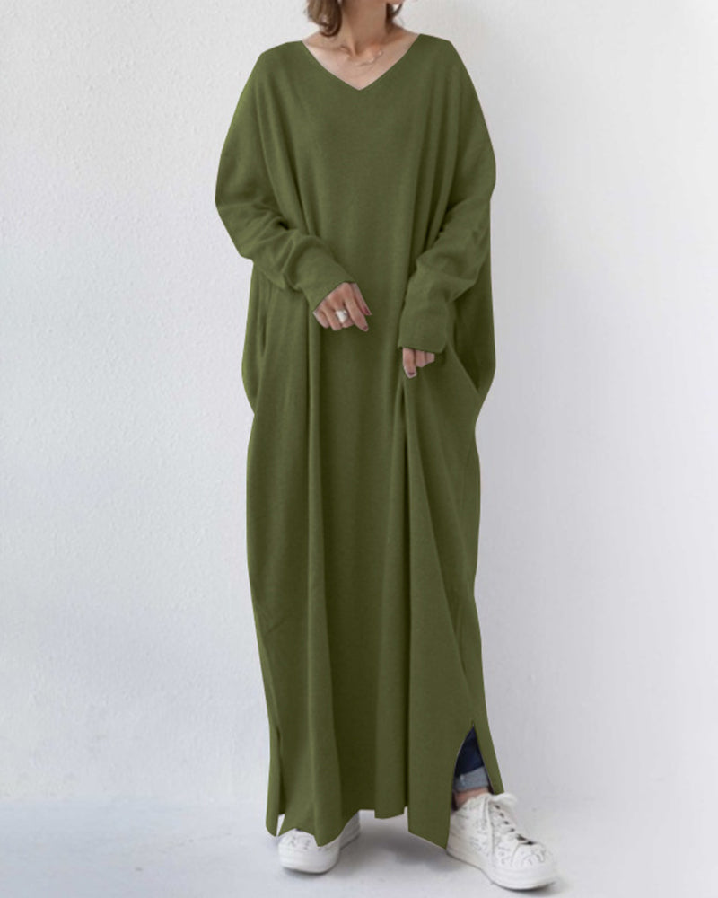 Elegant women's winter maxi dress with long sleeves in flowing silhouette, refined cold-weather style