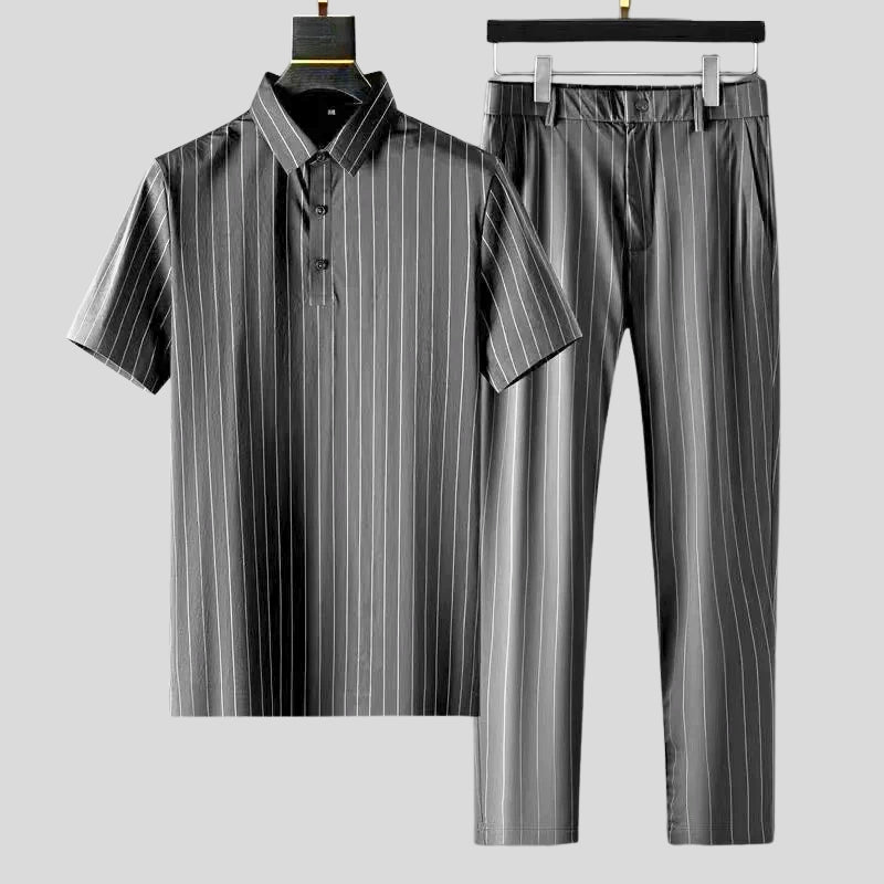 Tavellé two-piece set in neutral fabric with sharp collar, tailored leg, and relaxed short-sleeve silhouette