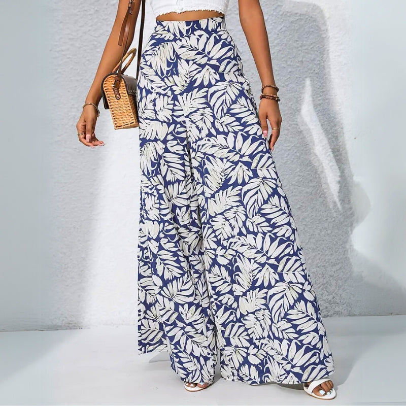Tropical print high-waist cotton trousers with roomy pockets, relaxed wide-leg silhouette for warm-weather style