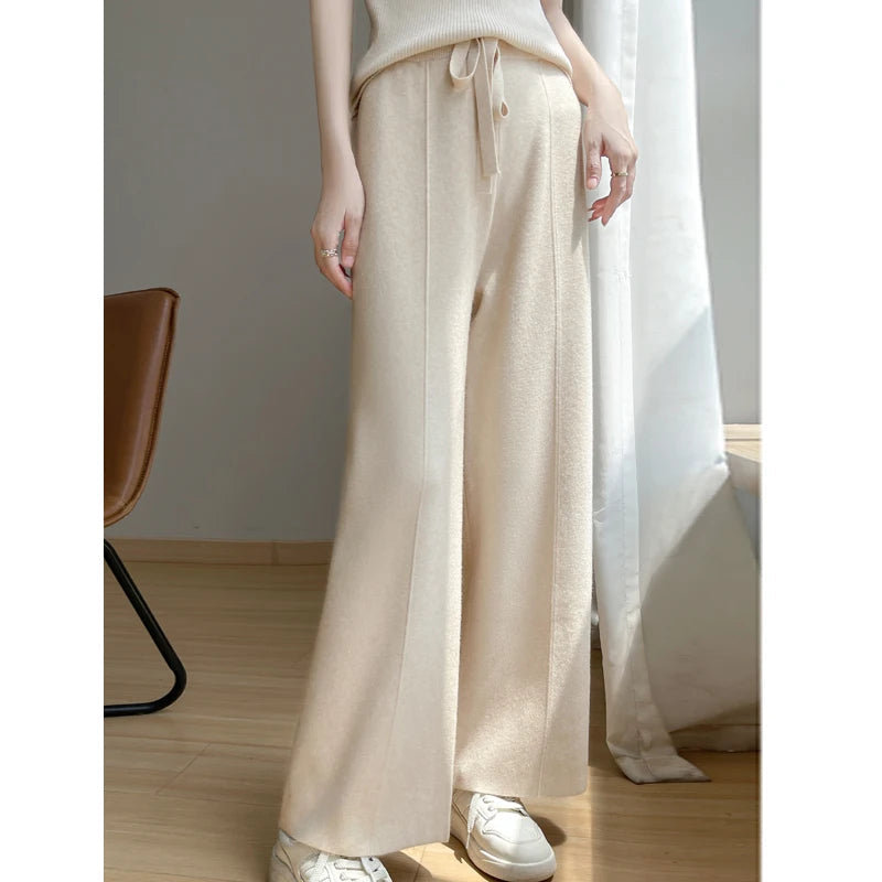 Ivory wide-leg cashmere blend pants high waist relaxed silhouette soft drape lounge casual wear