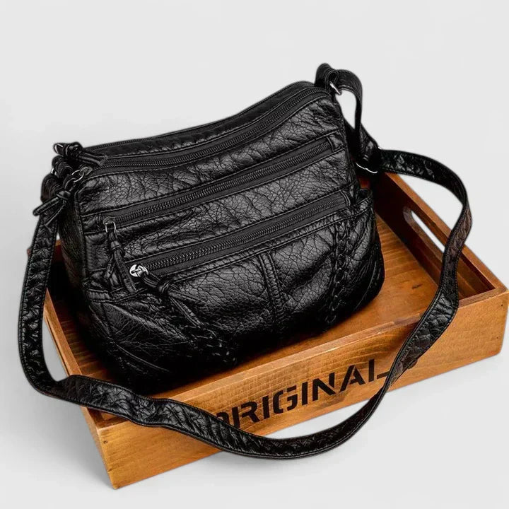 Mykahlynn elegant structured handbag in neutral tone, timeless design with sophisticated silhouette