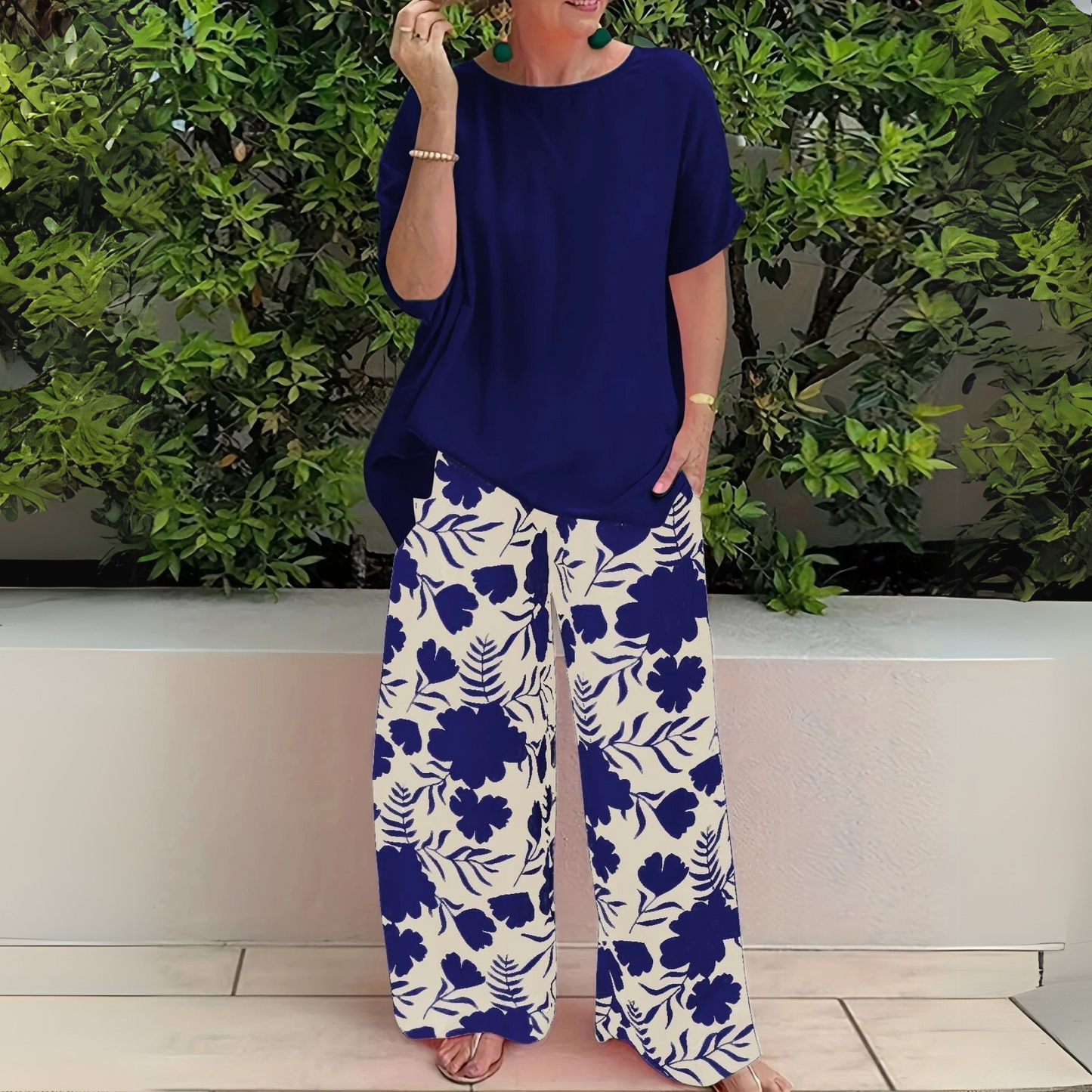 Elegant floral two-piece set in flowing fabric, relaxed flattering fit for effortless chic style