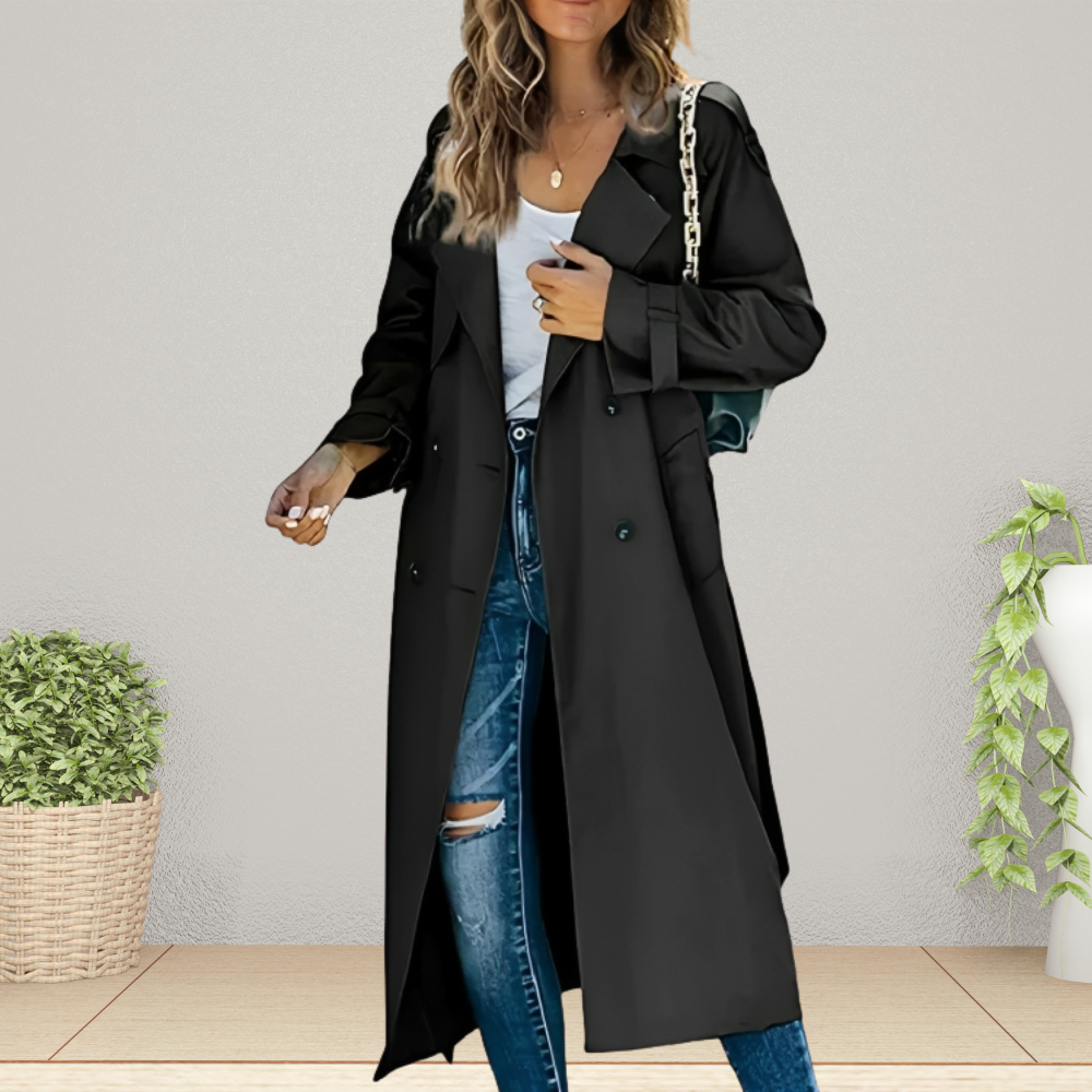 Women's beige double-breasted longline trench coat with classic tailoring and symmetrical button front