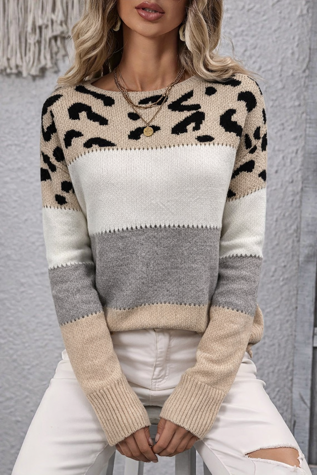 Cream elegant sweater relaxed silhouette soft premium knit flattering everyday layering style