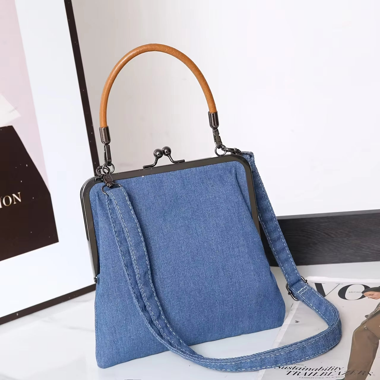 Wavlynn Isla structured frame handbag with gold kiss lock closure and classic silhouette