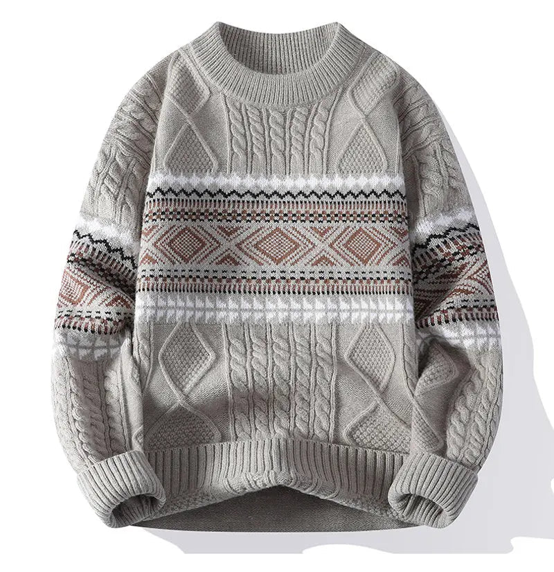 Cream relaxed-fit cable knit pullover sweater with Nordic-inspired texture and ribbed finish