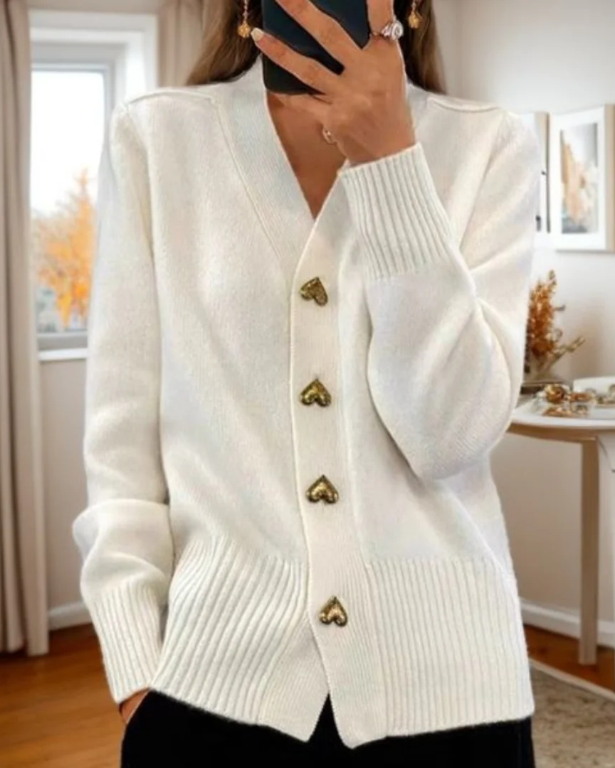 Elegant heart button cardigan soft breathable knit flattering silhouette playful charm everyday sophistication
