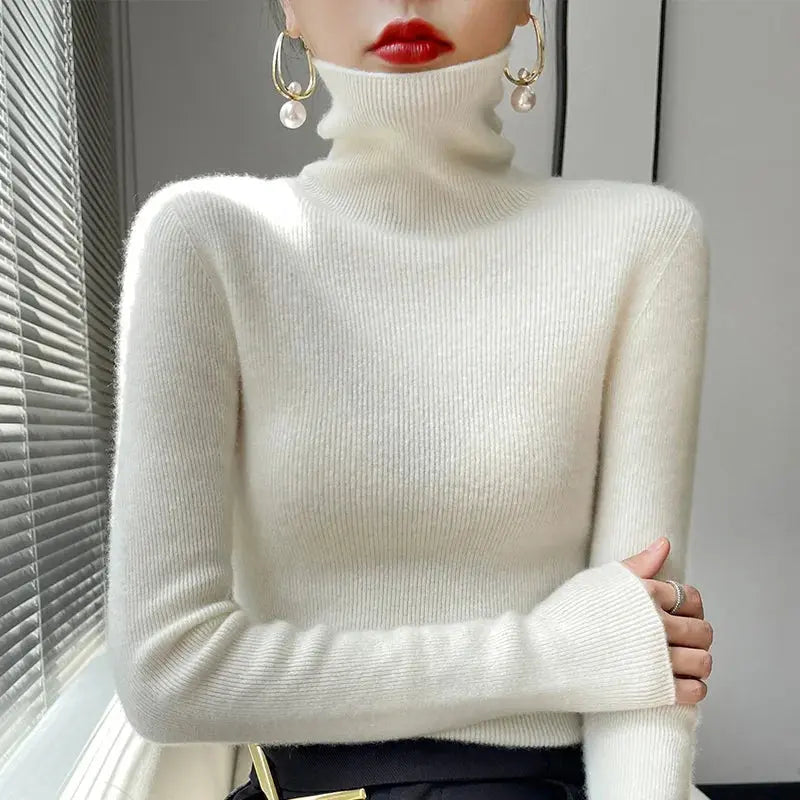 Women's cozy turtleneck sweater soft warm knit relaxed silhouette lightweight layering essential