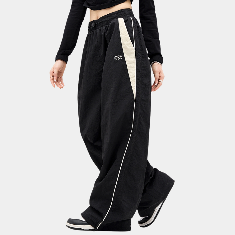 Women's loose-fit wide-leg pants with elastic waist, sporty side stripes, lightweight casual style