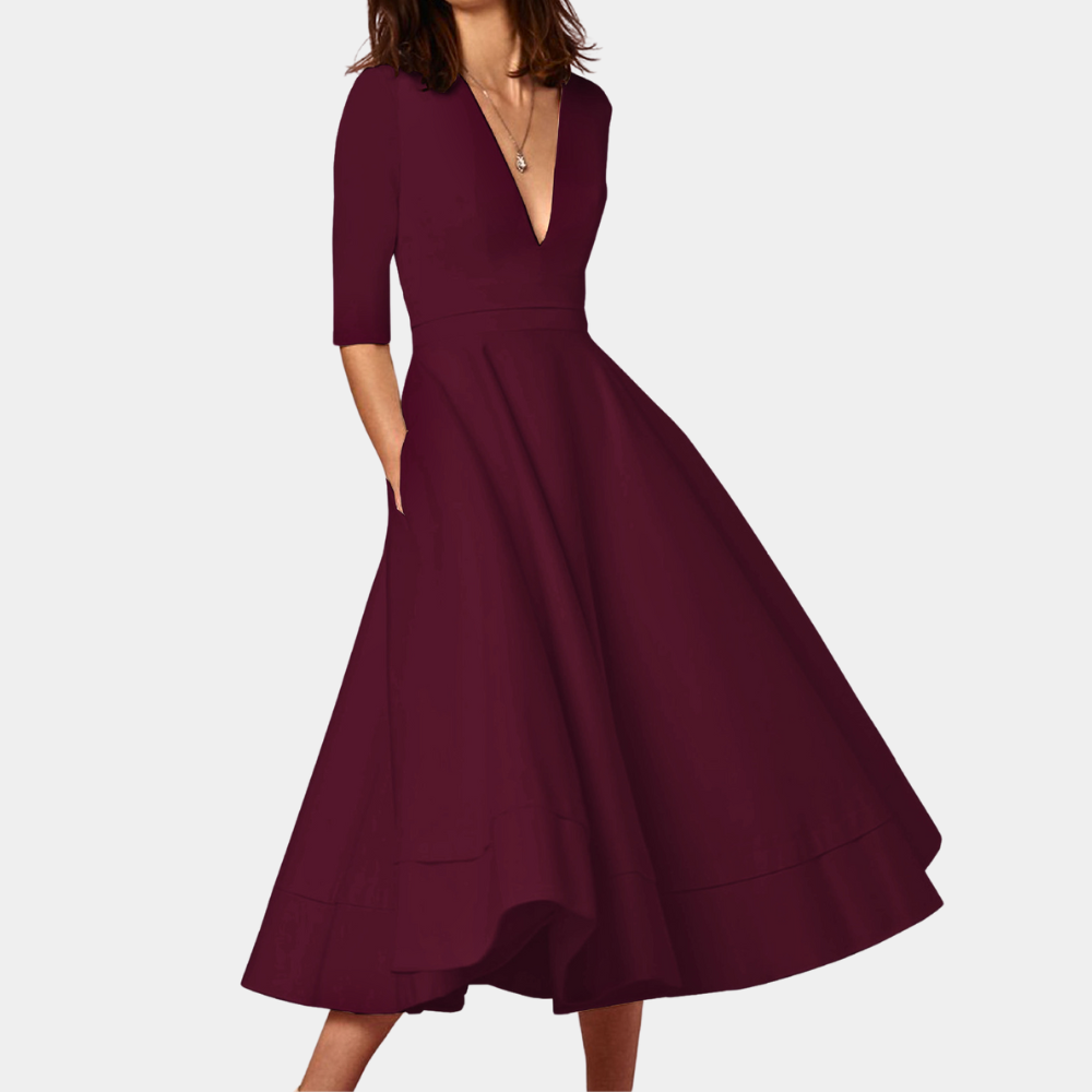 Women's elegant A-line midi dress in timeless cut with graceful flared skirt for feminine silhouette
