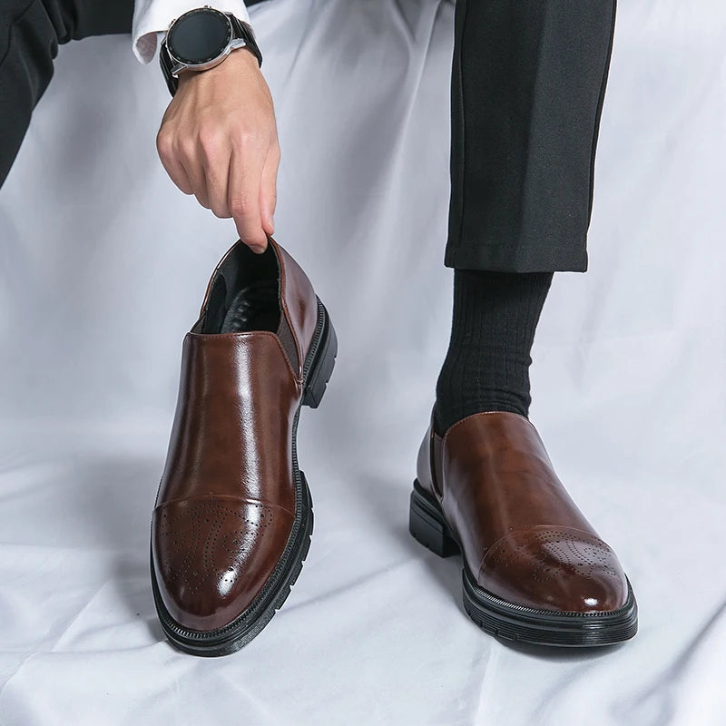 Cortas genuine leather slip-on brogue shoes with perforated cap toe detail for men
