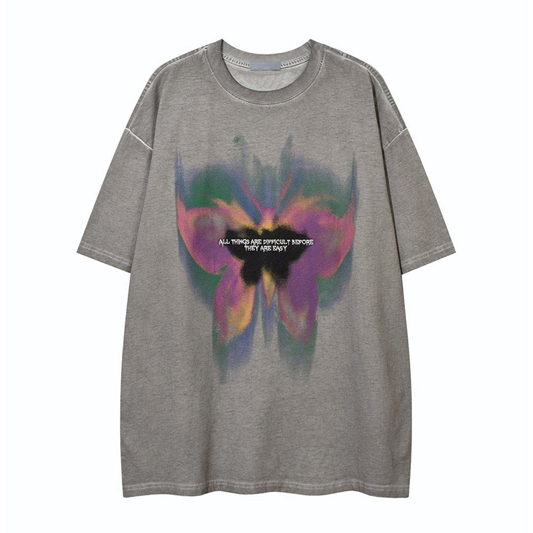 Vintage-washed white loose fit cotton tee with faded butterfly motif print and round neck