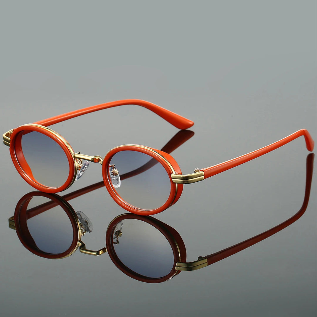 Retro round sunglasses with tinted lenses, sleek metal frame accents and adjustable nose pads for all-day comfort