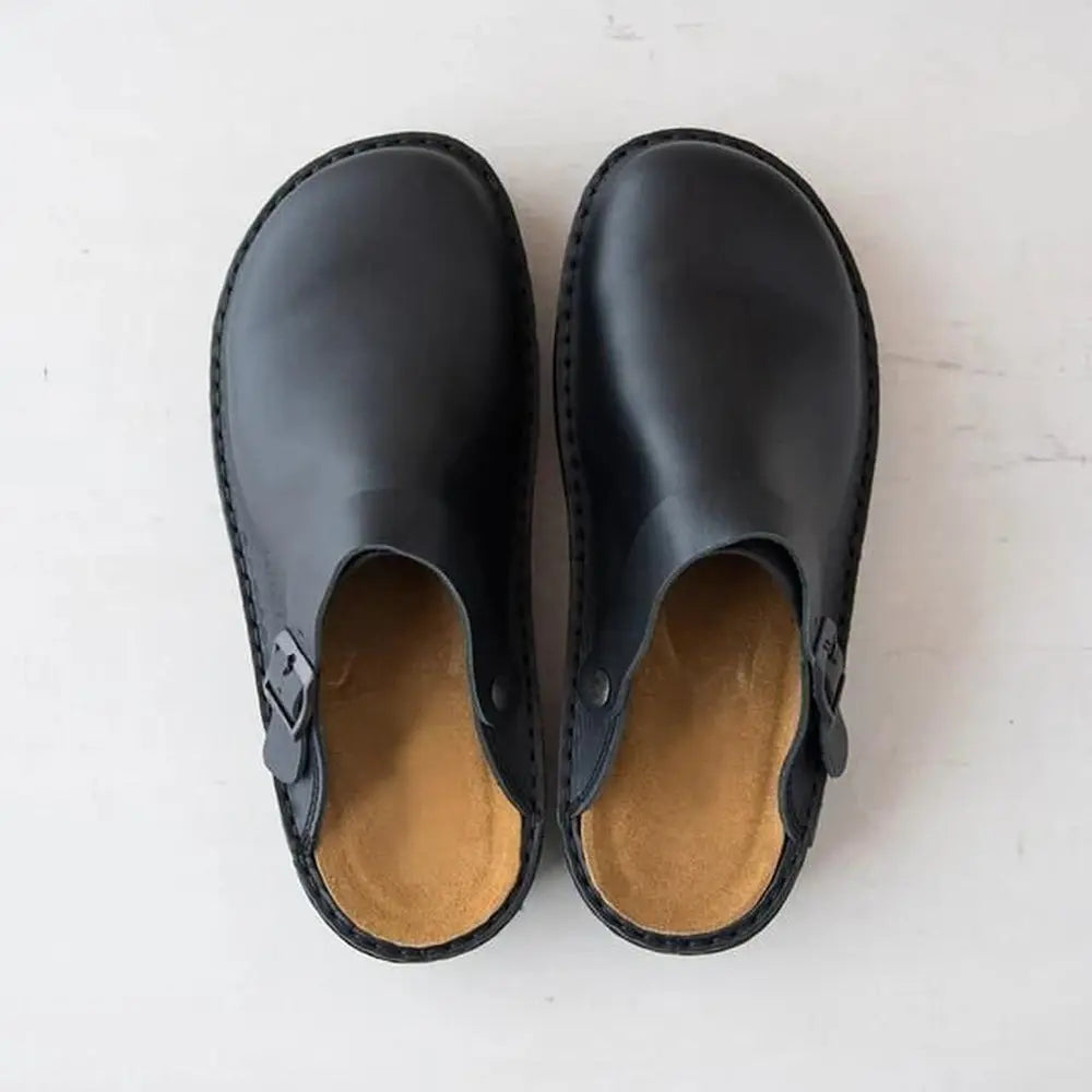Women's ergonomic slip-on clogs with cushioned footbed, classic neutral design for all-day comfort