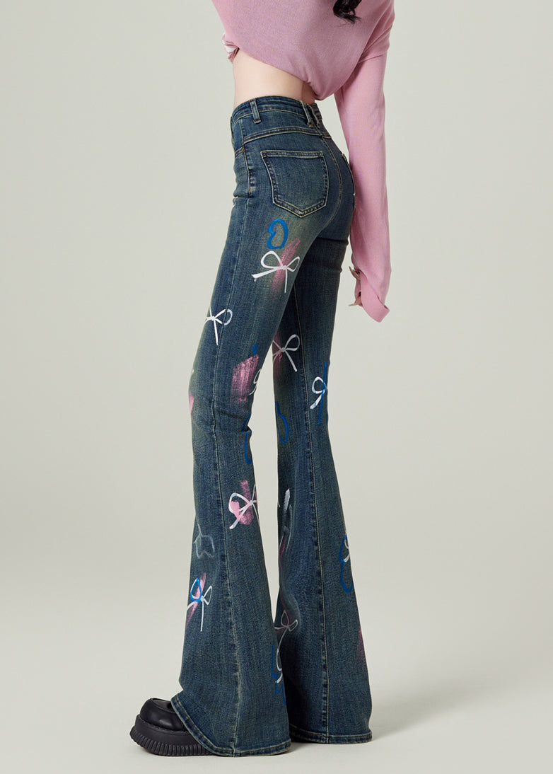 Pantalon Γ©vasΓ© en denim bleu Γ poches et nΕuds pour le printemps - Wavlynn