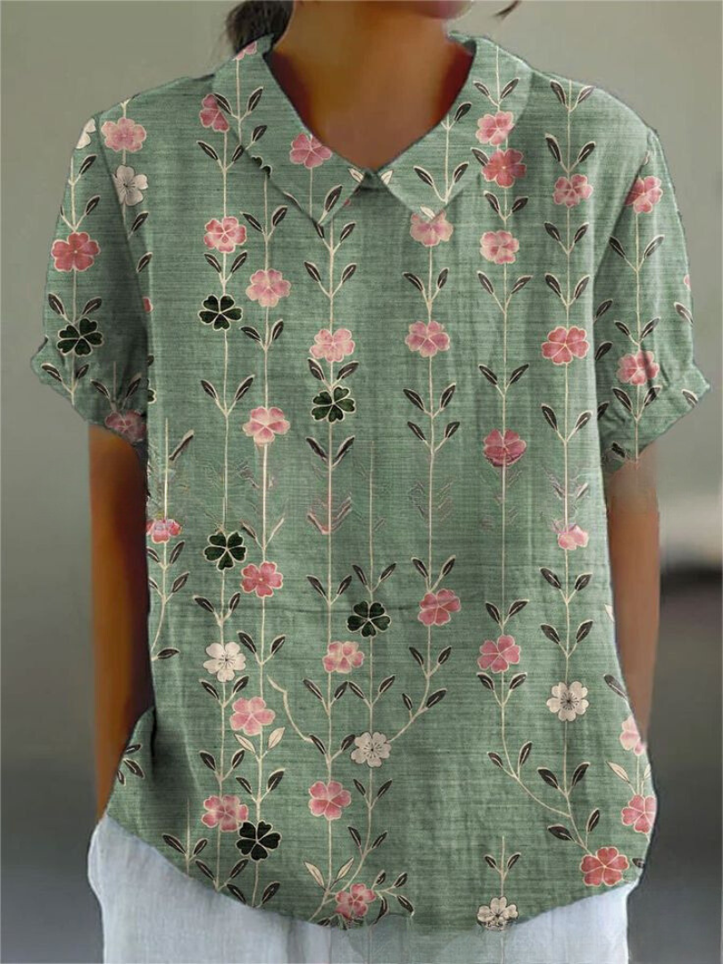 Women's relaxed floral print shirt with feminine bloom pattern, lightweight casual button-up style