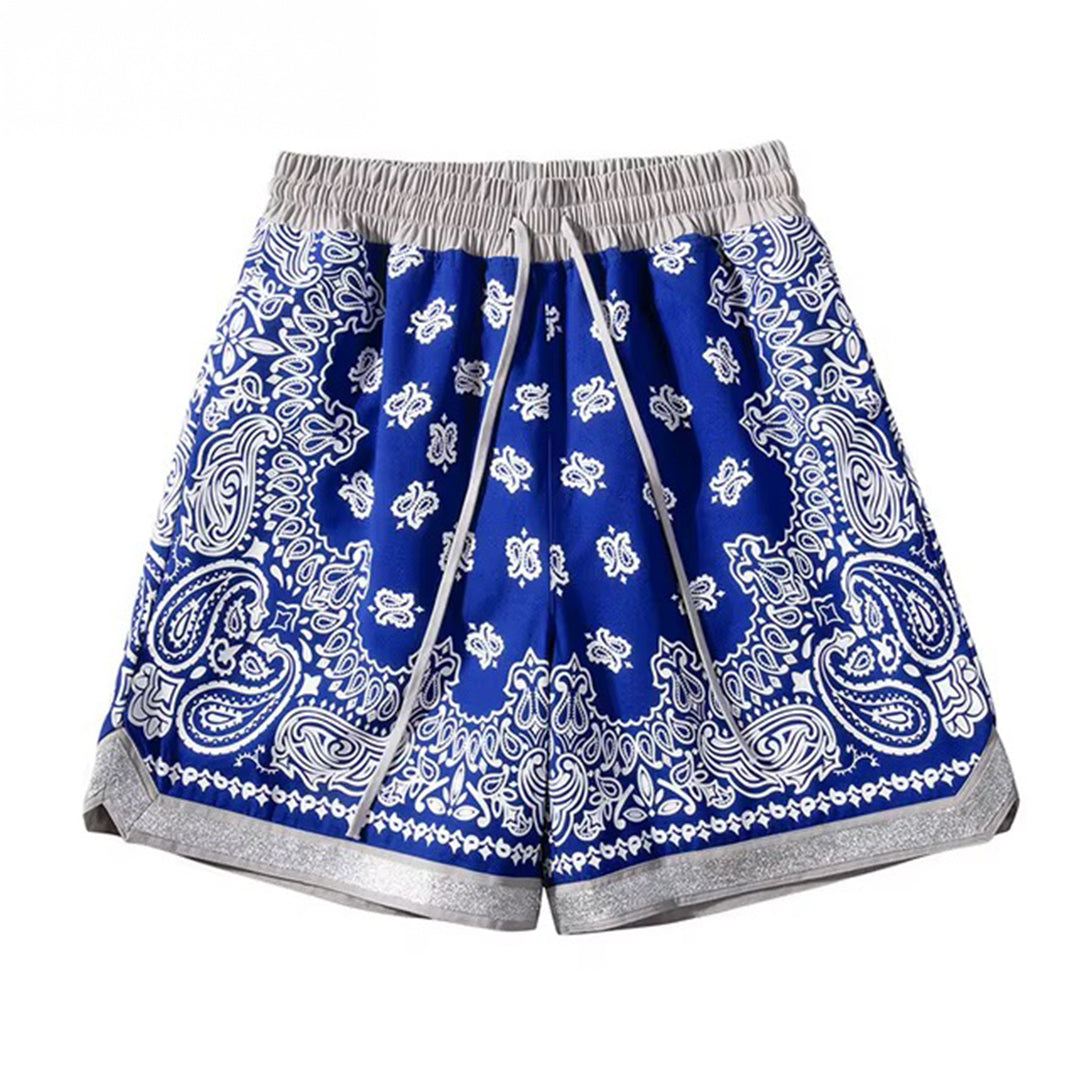 Loose fit paisley print basketball shorts in bandana pattern with elastic drawstring waist and side pockets