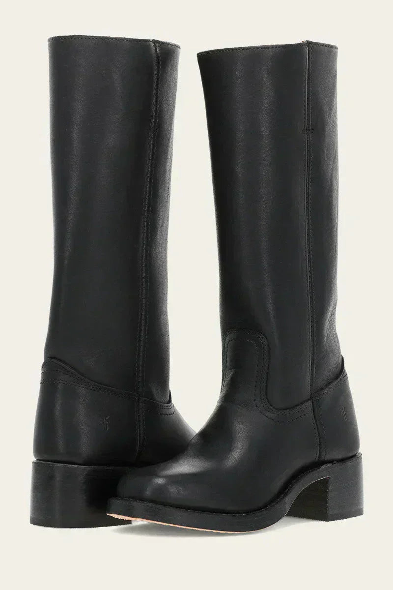 Black knee-high boots slim fit silhouette with structured sole for a polished modern look