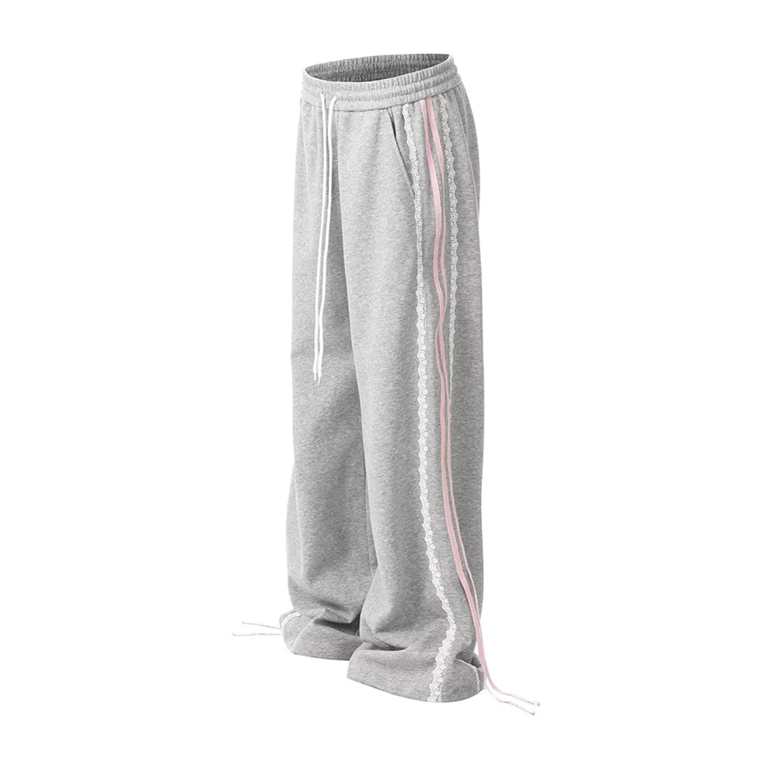 Striped loose-fit cotton sweatpants with floral lace detail, mid-rise drawstring waist, casual style