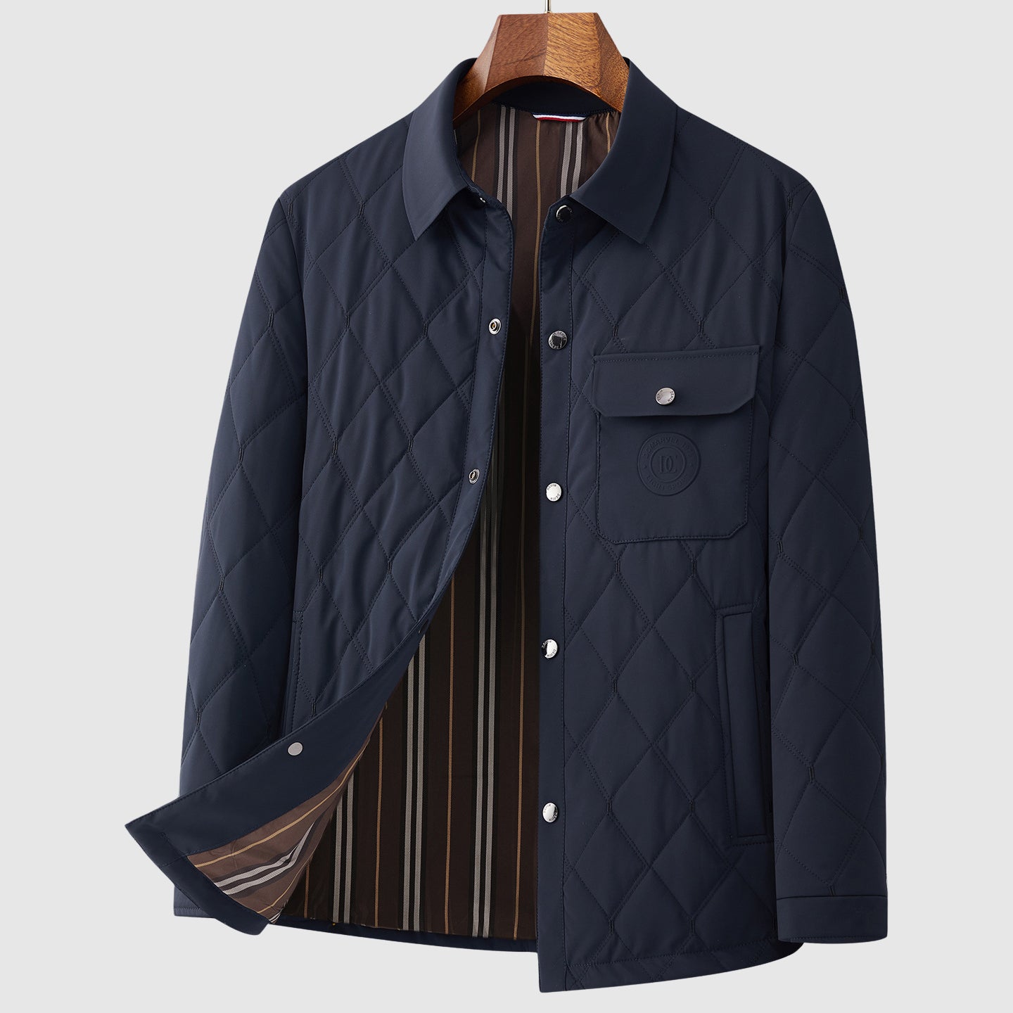 Men's hip-length quilted jacket with diamond stitch pattern, button front, and patch pockets