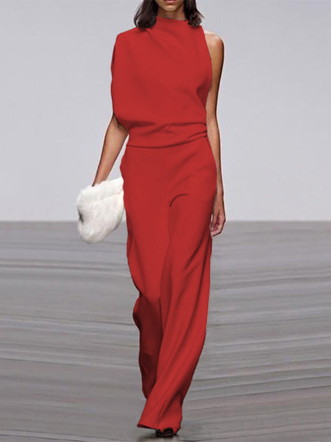 Women's sleeveless one-shoulder wide-leg jumpsuit with structured asymmetric neckline and fluid formal silhouette