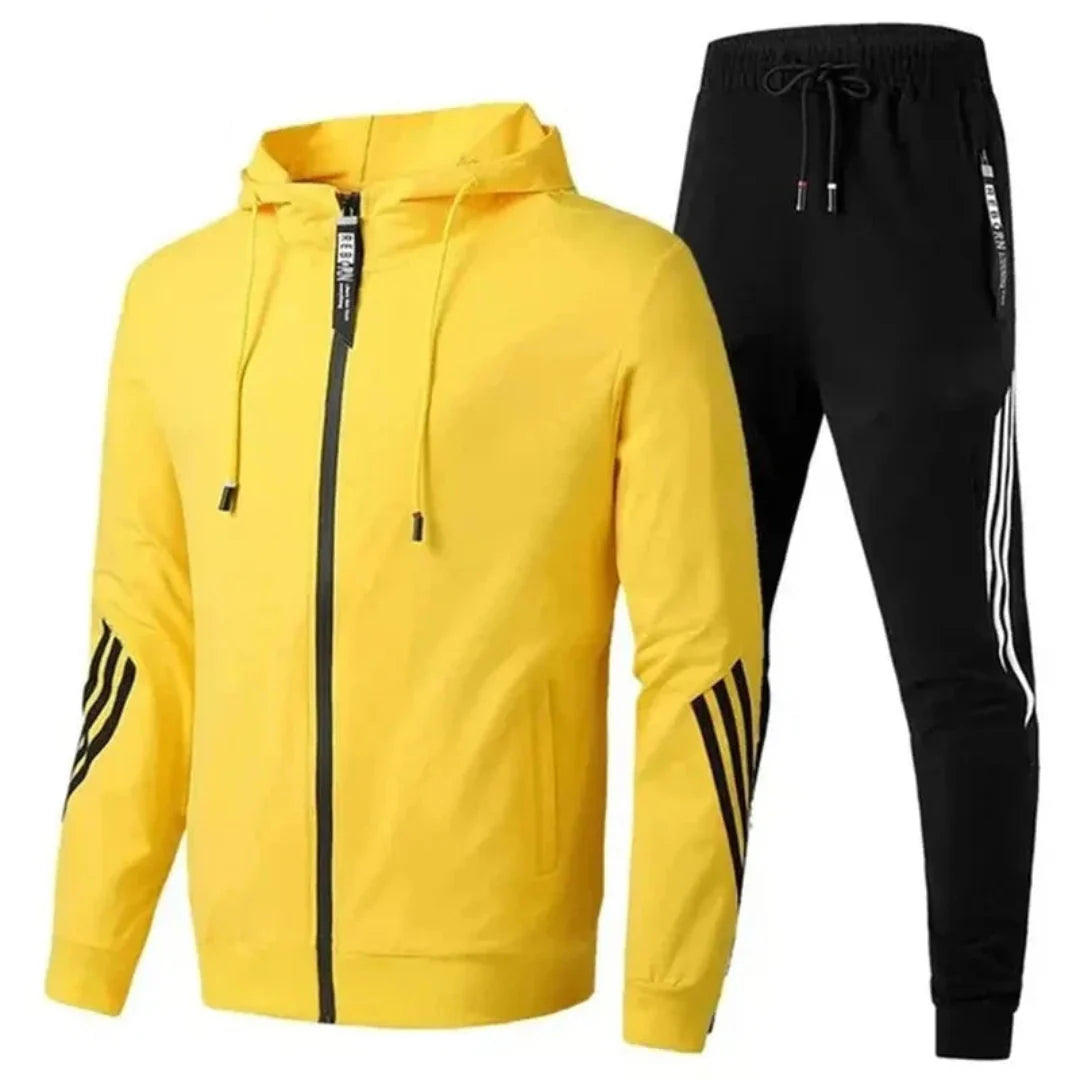 Navy men's two-piece tracksuit set with zip-up jacket and relaxed fit joggers in premium fabric
