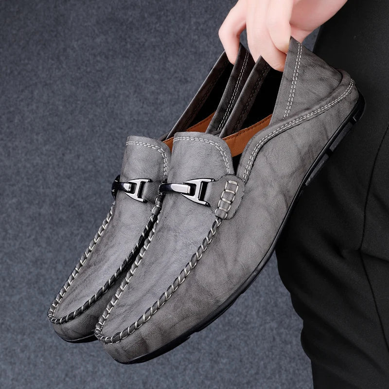 Men's genuine leather loafers with weathered finish and polished metal bit detail for refined casual style