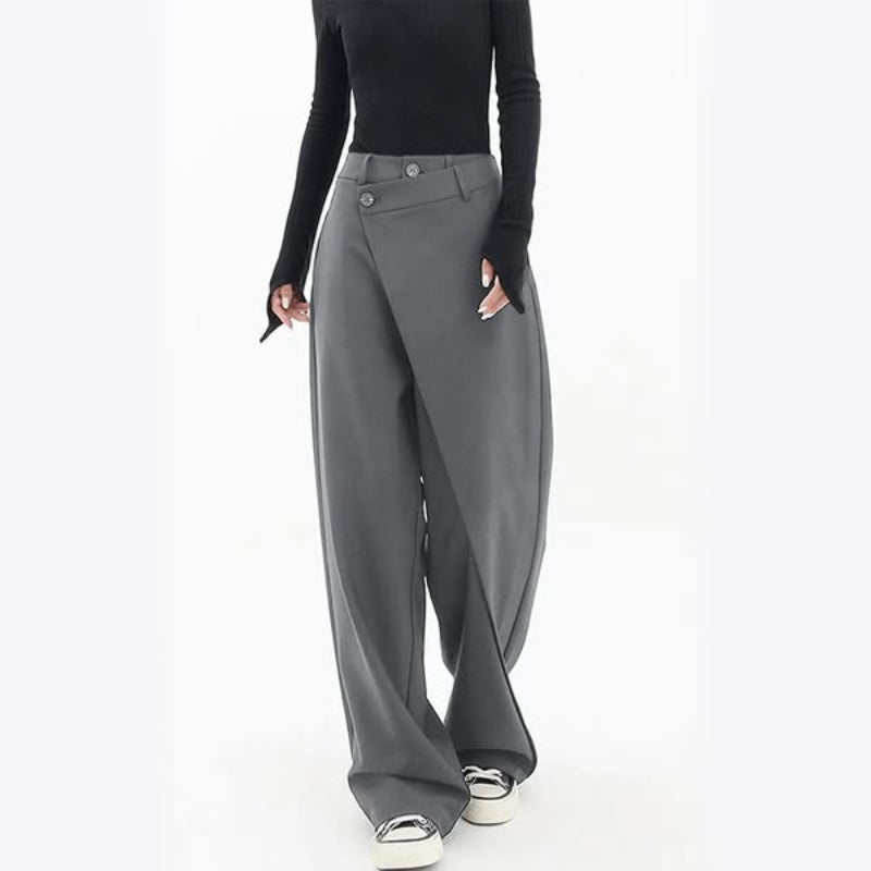 Black wide-leg wrap trousers with asymmetric crossover front and statement waist buttons