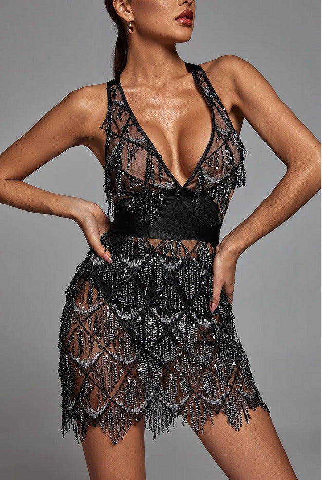 Women's fitted midi dress with deep V-neckline, sequin and fringe details for glamorous evenings
