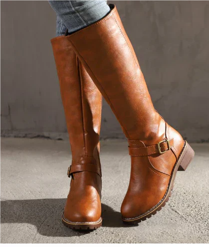 Women's black knee-high boots with sleek silhouette and leg-lengthening contoured design