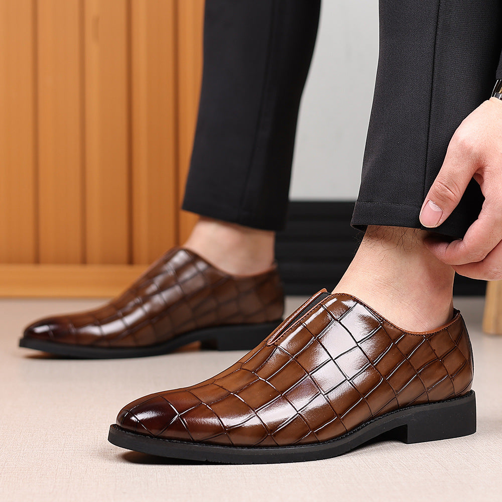 Men's black high-gloss crocodile-embossed leather loafers with sleek slip-on silhouette