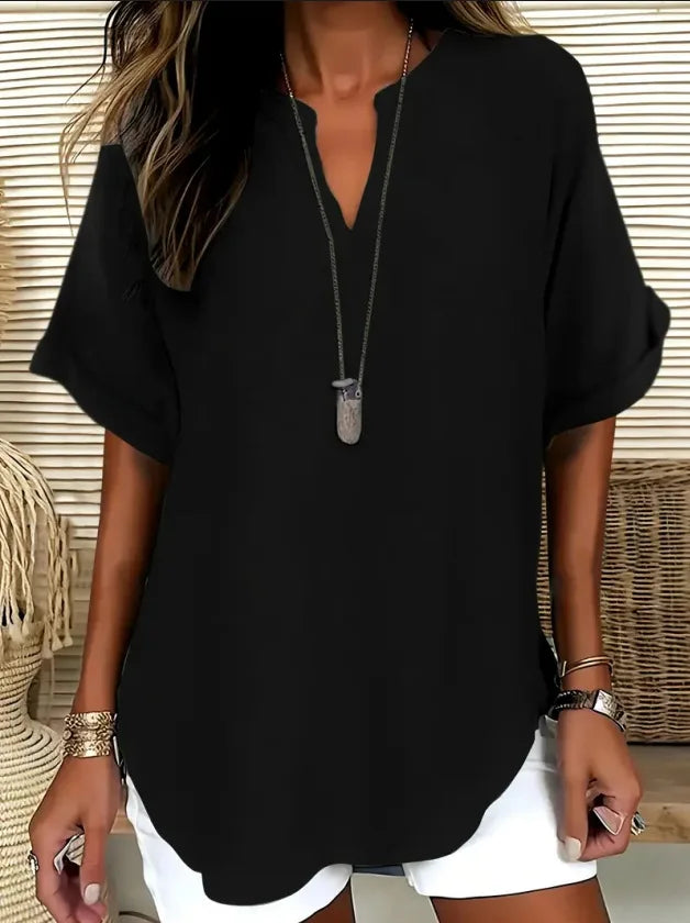 Women's flowy tunic blouse with flattering V-neckline, relaxed breezy fit, versatile everyday style