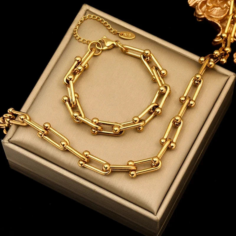 Orsini Astoria gold chain necklace with polished spherical link accents for a luminous statement look
