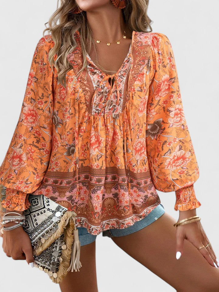 Women's pink floral boho blouse V-neck puff sleeve top with botanical print flowing silhouette