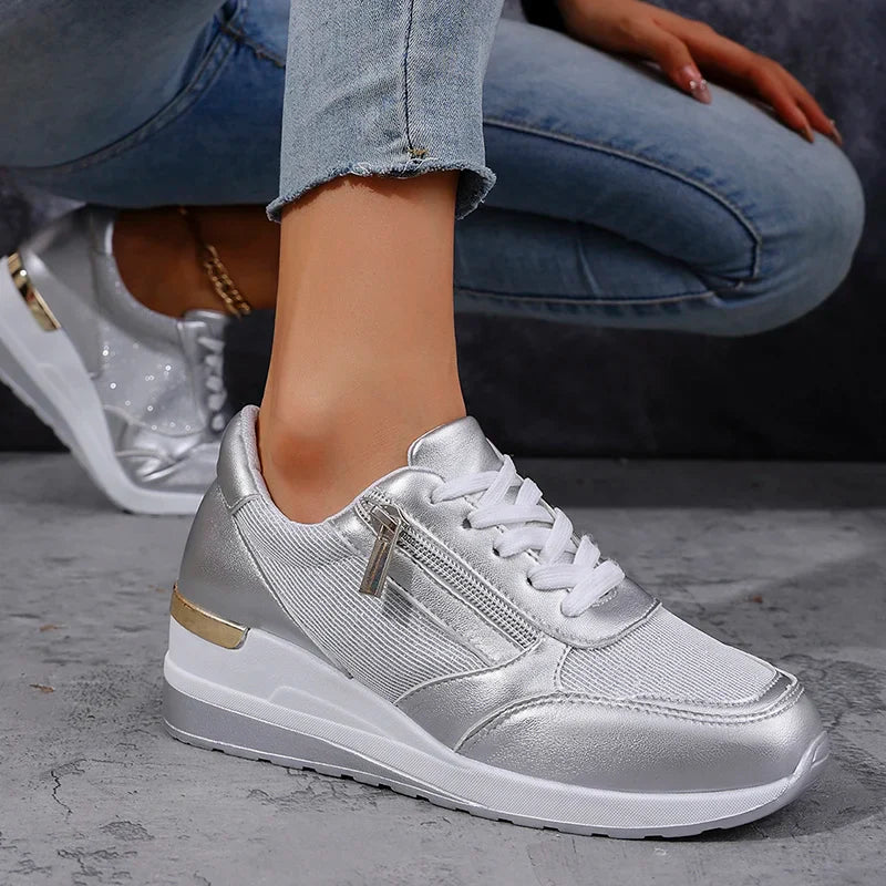 Women's silver metallic platform sneakers with lunar-shine upper and bold chunky sole