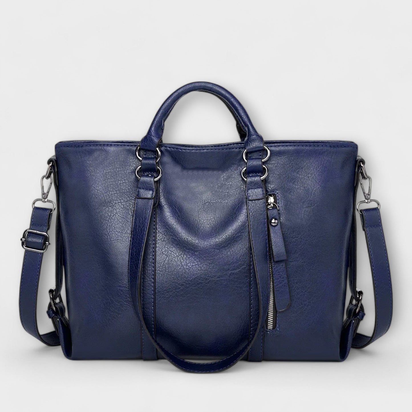 Black professional handbag with double handles, adjustable shoulder strap, and spacious compartment
