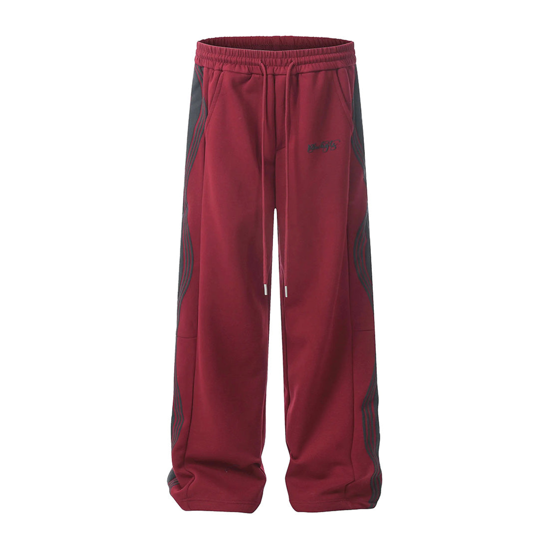 Men's loose fit black track pants with wavy side stripe and drawstring waist, cotton-poly blend