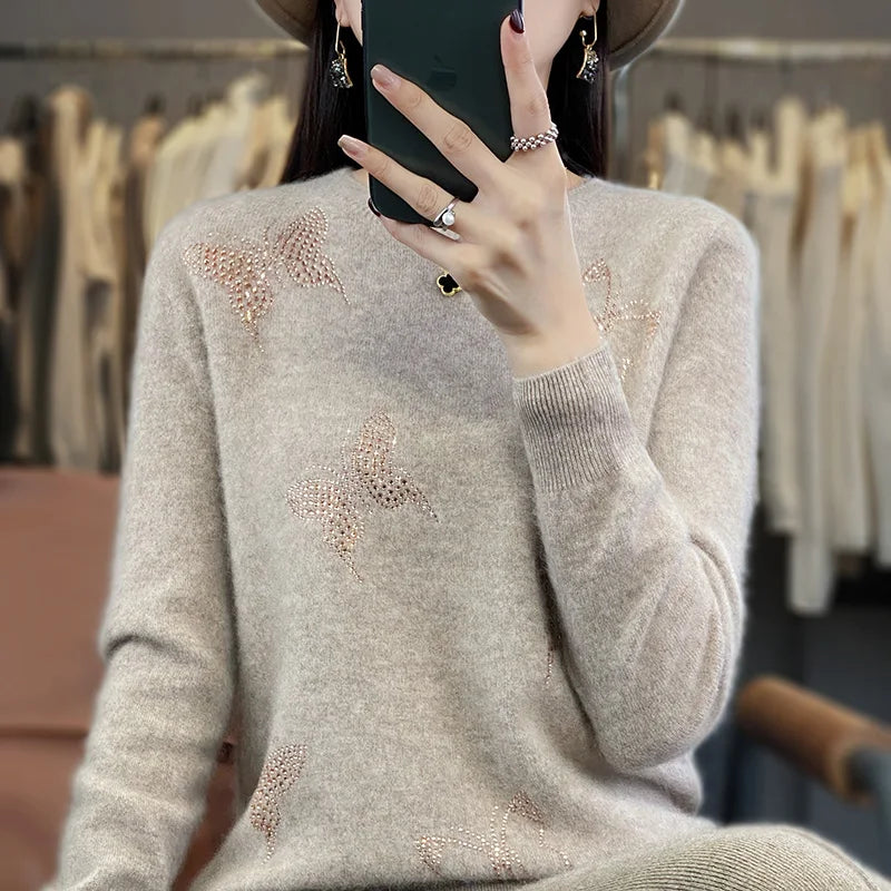 Odessa butterfly sweater relaxed fit with delicate feminine embellishments in soft neutral tones