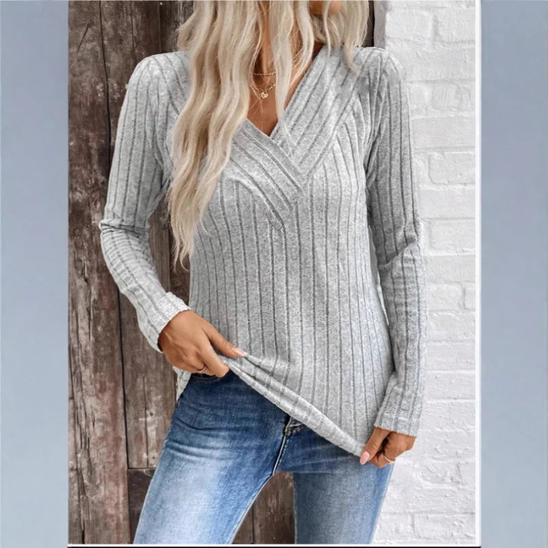 Quinn elegant sunken stripe sweater in neutral tones, relaxed fit with subtle textured stripe pattern